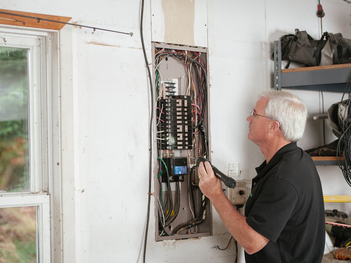 Arcwell electrician performing a residential safety inspection